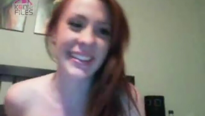 Exhibitionist Redhead Reveals Her Breasts On Camera